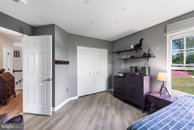 1 Deep Pond Dr, Spring City, PA 19475 - bedroom with light wood finished floors, a closet, baseboards, and an office area