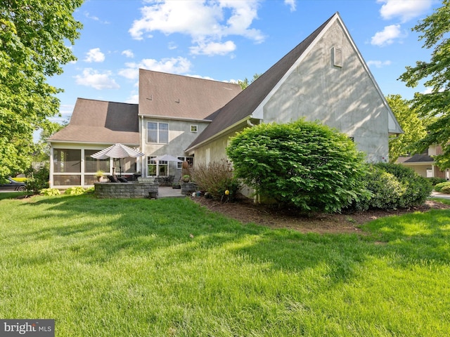 744 Goose Neck Dr, Lititz, PA 17543 - rear view of property with a patio area, a sunroom, a lawn, and roof with shingles