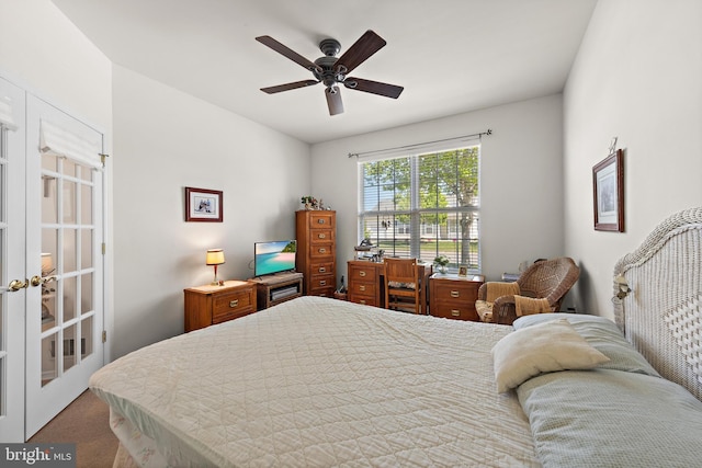 carpeted bedroom with french doors and a ceiling fan