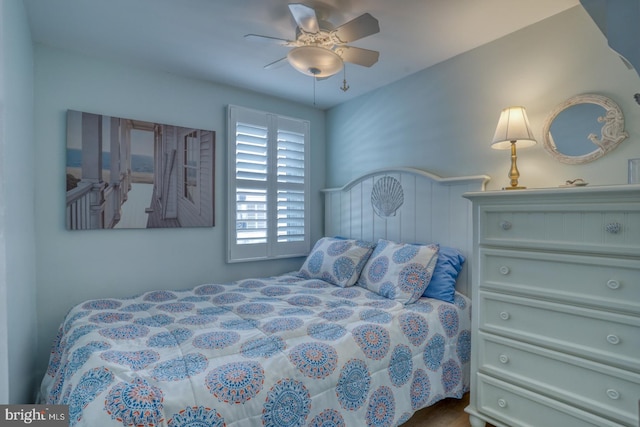 2 E Atlantic St Unit 1, Fenwick Island, DE 19944 - bedroom with a ceiling fan