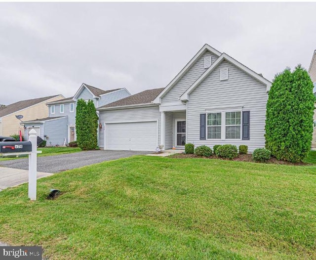 176 Bobbys Branch Rd Unit 56, Millsboro, DE 19966 - view of front of house featuring a garage, driveway, and a front yard