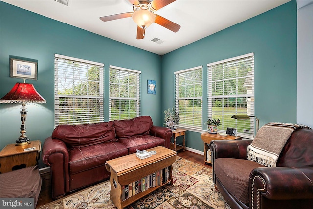 176 Bobbys Branch Rd Unit 56, Millsboro, DE 19966 - living area with wood finished floors, ceiling fan, and baseboards