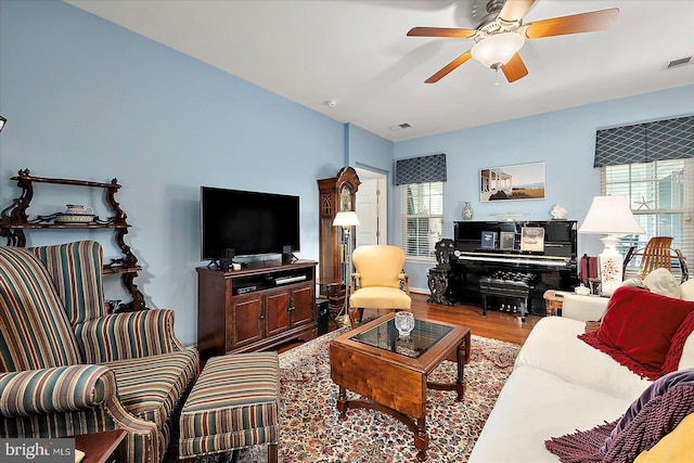 176 Bobbys Branch Rd Unit 56, Millsboro, DE 19966 - living room featuring plenty of natural light, wood finished floors, and a ceiling fan