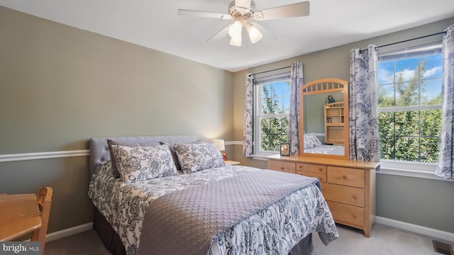 2707 Maynard Rd, Crofton, MD 21114 - bedroom with baseboards, light carpet, and a ceiling fan