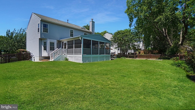 2707 Maynard Rd, Crofton, MD 21114 - back of house featuring a sunroom and a chimney