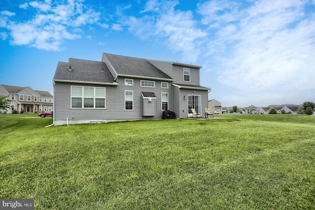 44 Danbury Dr, Mechanicsburg, PA 17050 - back of property with a yard and roof with shingles