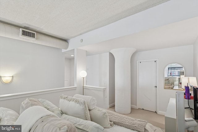 carpeted bedroom featuring baseboards