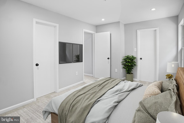 3104 Dynasty Dr, District Heights, MD 20747 - bedroom with light carpet, baseboards, recessed lighting, and a closet