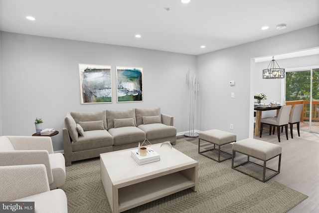 3104 Dynasty Dr, District Heights, MD 20747 - living room featuring recessed lighting, a chandelier, and light wood-style flooring