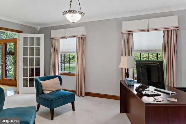 home office featuring light carpet, ornamental molding, french doors, and baseboards