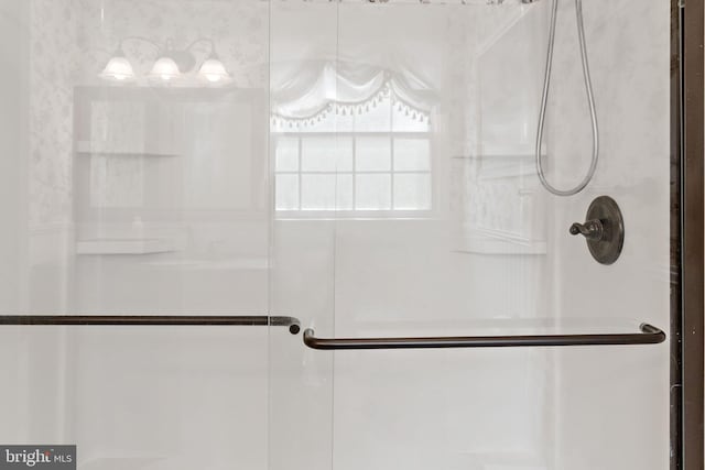 full bath featuring a stall shower