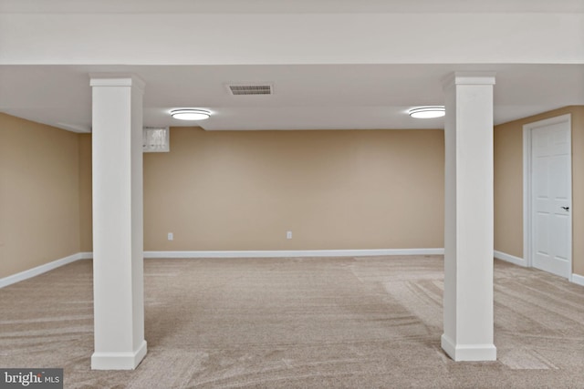 finished below grade area featuring carpet flooring and baseboards