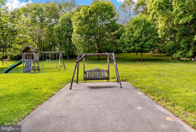 view of play area featuring a lawn
