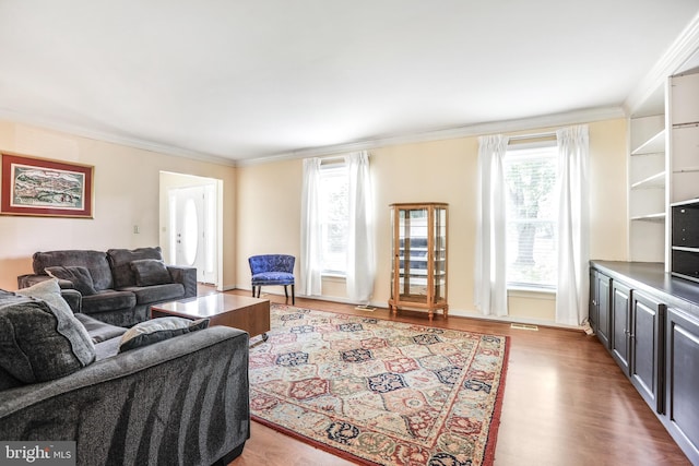 2158 Sebastian Rd, Fredericksburg, VA 22405 - living room with healthy amount of natural light, crown molding, and wood finished floors