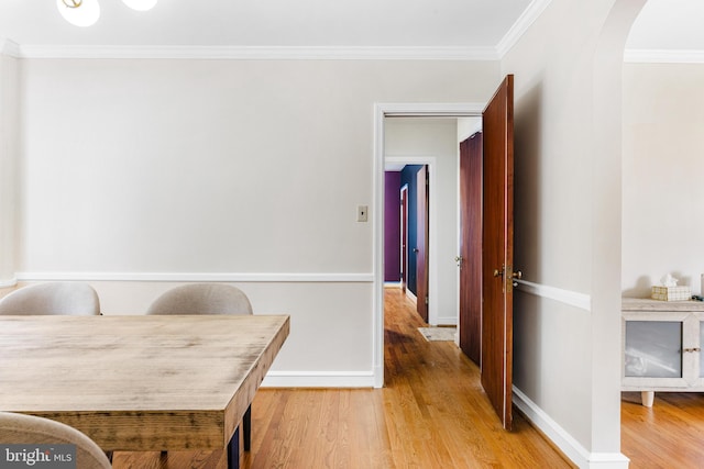 1417 Glendale Rd, Baltimore, MD 21239 - home office featuring arched walkways, wood finished floors, crown molding, and baseboards