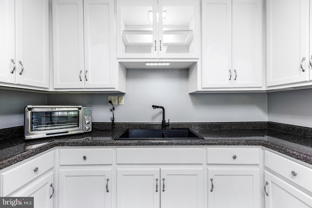 1417 Glendale Rd, Baltimore, MD 21239 - kitchen with a sink and white cabinetry