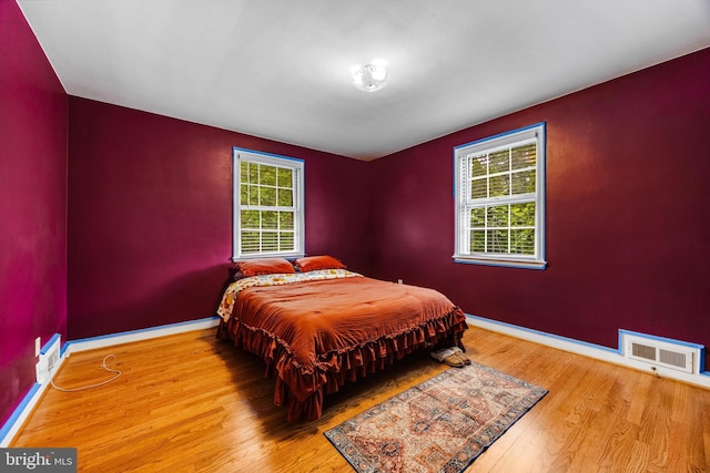 1417 Glendale Rd, Baltimore, MD 21239 - bedroom featuring wood finished floors and baseboards