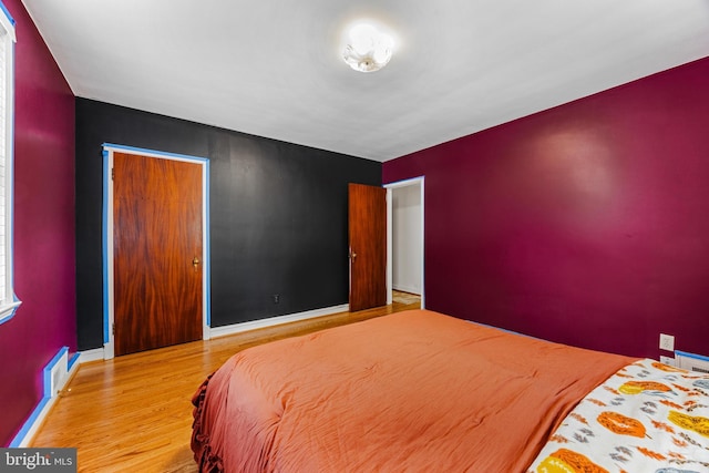 1417 Glendale Rd, Baltimore, MD 21239 - bedroom featuring wood finished floors and baseboards