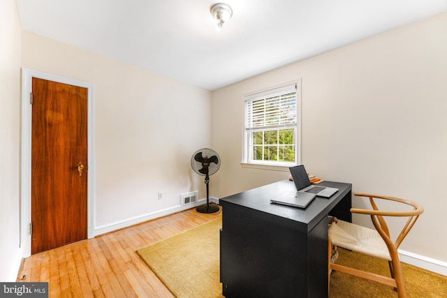 1417 Glendale Rd, Baltimore, MD 21239 - office area with wood-type flooring and baseboards
