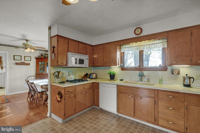 70 Miller Rd, Kutztown, PA 19530 - kitchen with ceiling fan, light countertops, a sink, and white appliances