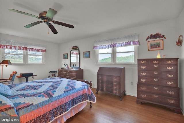 70 Miller Rd, Kutztown, PA 19530 - bedroom with multiple windows, wood finished floors, and ceiling fan