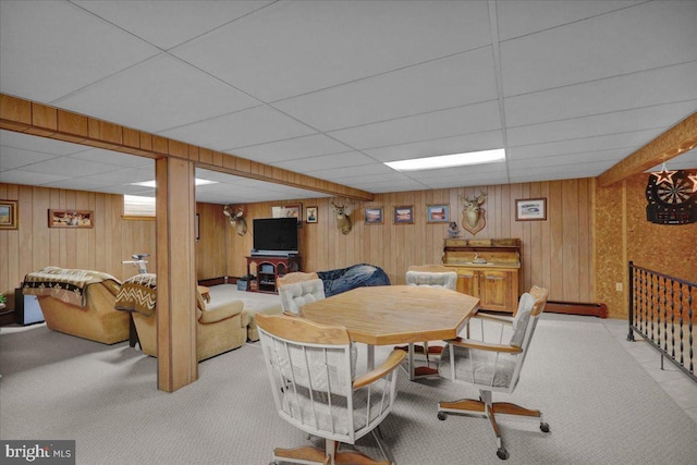 70 Miller Rd, Kutztown, PA 19530 - dining room featuring light carpet, wooden walls, and a drop ceiling