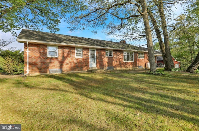 70 Miller Rd, Kutztown, PA 19530 - view of front of house featuring a front lawn and brick siding