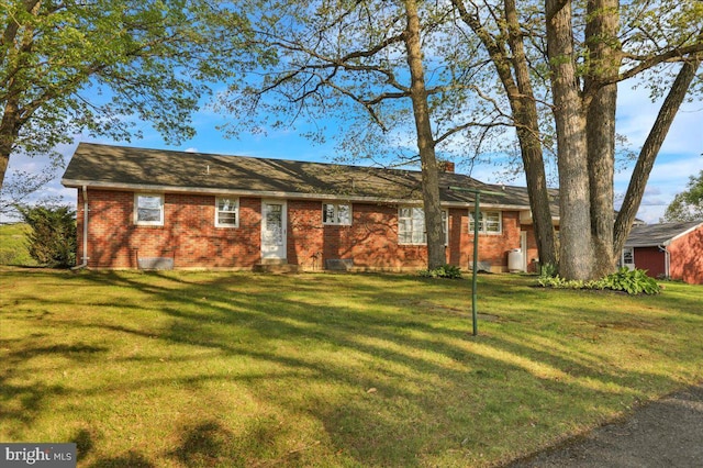 70 Miller Rd, Kutztown, PA 19530 - single story home with a front lawn, a chimney, and brick siding