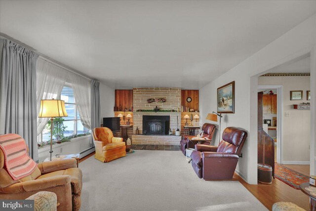 70 Miller Rd, Kutztown, PA 19530 - living room featuring baseboards, baseboard heating, and a fireplace