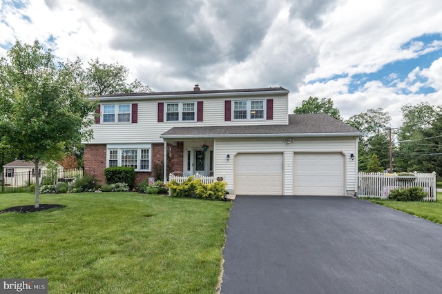 2921 Toll Gate Dr, East Norriton, PA 19403 - traditional home with asphalt driveway, an attached garage, and brick siding