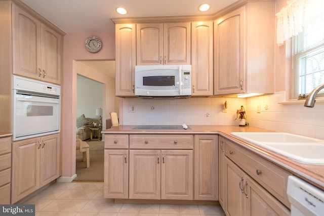 2921 Toll Gate Dr, East Norriton, PA 19403 - kitchen with white appliances, a sink, light brown cabinetry, light countertops, and decorative backsplash