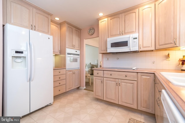 2921 Toll Gate Dr, East Norriton, PA 19403 - kitchen with white appliances, light brown cabinets, recessed lighting, light countertops, and tasteful backsplash