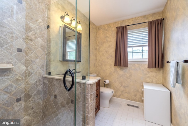 2921 Toll Gate Dr, East Norriton, PA 19403 - full bath with tile patterned flooring, toilet, a tile shower, vanity, and baseboards