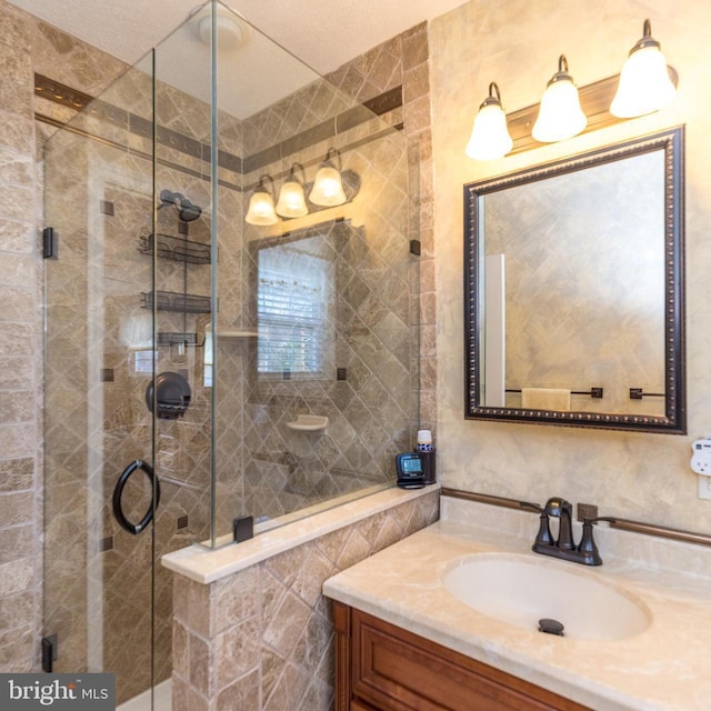 2921 Toll Gate Dr, East Norriton, PA 19403 - full bathroom featuring tile walls, a stall shower, and vanity