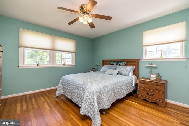 2921 Toll Gate Dr, East Norriton, PA 19403 - bedroom featuring wood finished floors, baseboards, and a ceiling fan