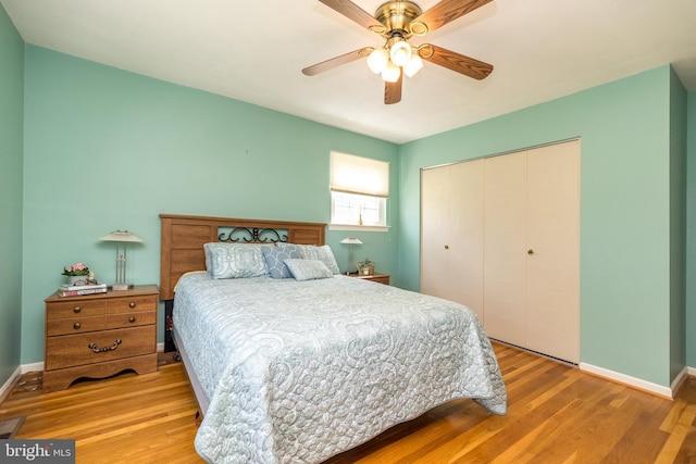 2921 Toll Gate Dr, East Norriton, PA 19403 - bedroom with wood finished floors, a closet, a ceiling fan, and baseboards