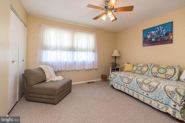 2921 Toll Gate Dr, East Norriton, PA 19403 - living area with carpet floors, a ceiling fan, and baseboards