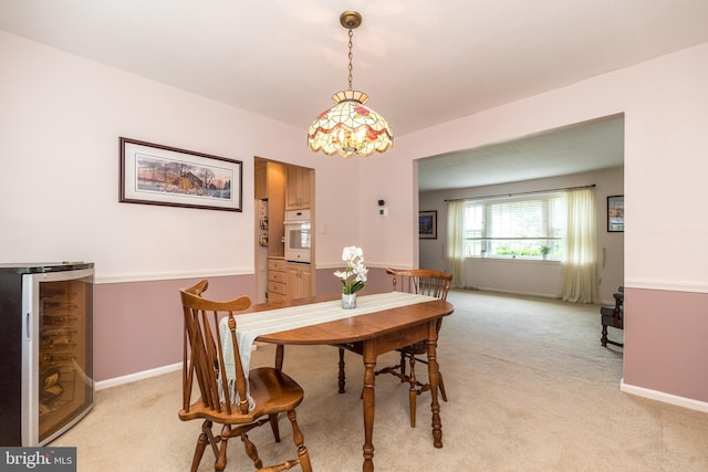 2921 Toll Gate Dr, East Norriton, PA 19403 - dining room with beverage cooler, light colored carpet, and baseboards