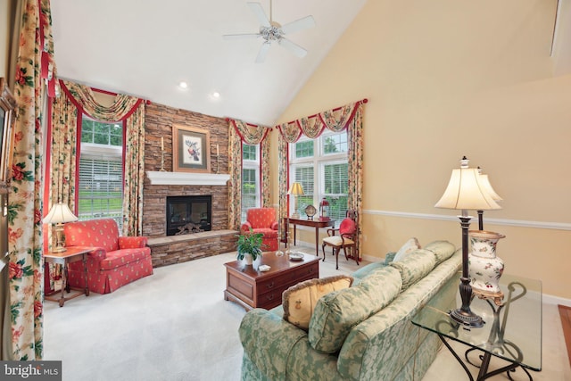 10017 Prestwich Ter, Ijamsville, MD 21754 - carpeted living area featuring a ceiling fan, high vaulted ceiling, a stone fireplace, baseboards, and recessed lighting