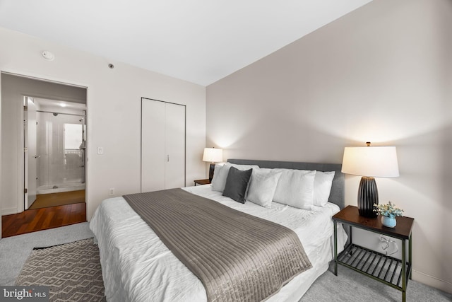 2101 Market St Unit 705, Philadelphia, PA 19103 - bedroom featuring carpet flooring, a closet, and baseboards