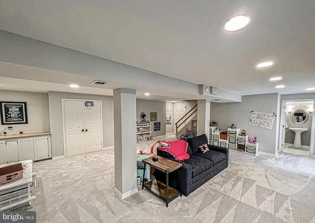 1448 Laurel Hill Rd, Vienna, VA 22182 - living area with light colored carpet, recessed lighting, and stairs