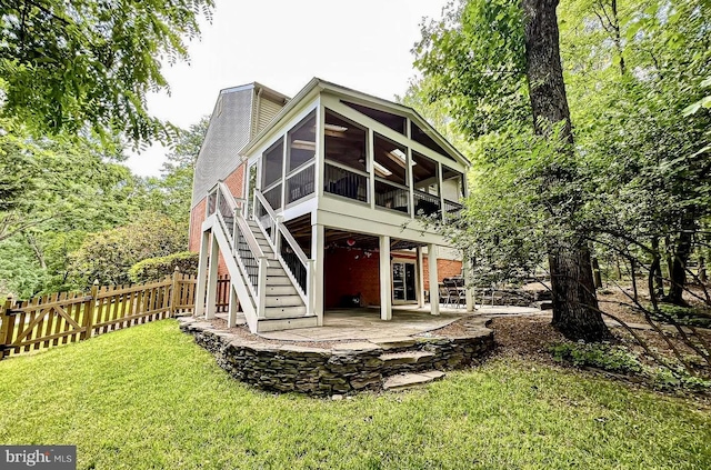 1448 Laurel Hill Rd, Vienna, VA 22182 - rear view of house featuring a patio, a sunroom, and stairway