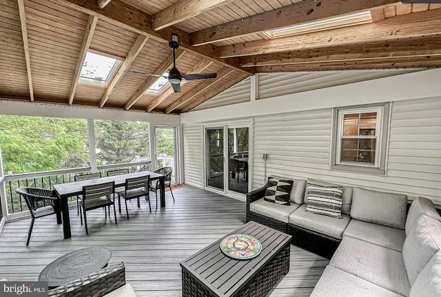 1448 Laurel Hill Rd, Vienna, VA 22182 - sunroom with outdoor dining area, a ceiling fan, an outdoor living space, and a skylight