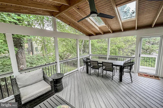 1448 Laurel Hill Rd, Vienna, VA 22182 - sunroom featuring a ceiling fan, a skylight, lofted ceiling, and outdoor dining space