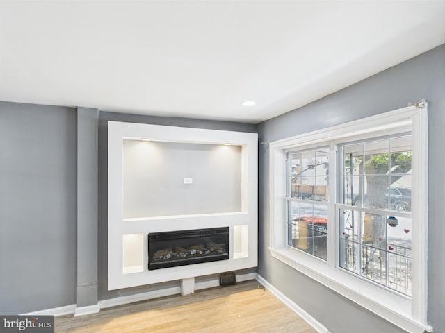 room details with wood finished floors and baseboards