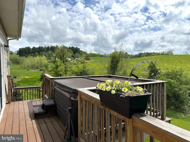 wooden deck with a rural view