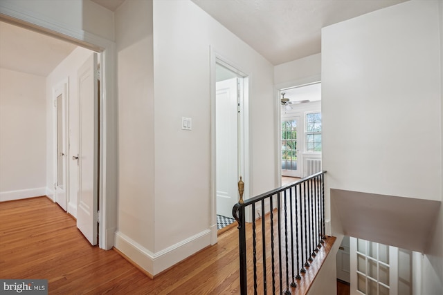 1362 Sheridan St NW, Washington, DC 20011 - hall featuring an upstairs landing and light wood-style floors