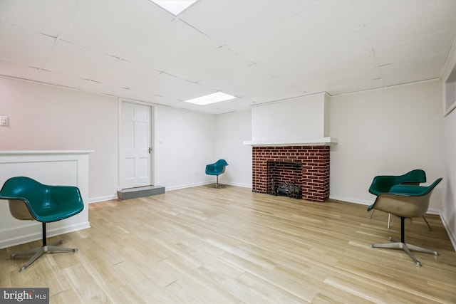 1362 Sheridan St NW, Washington, DC 20011 - living area featuring a fireplace and wood finished floors