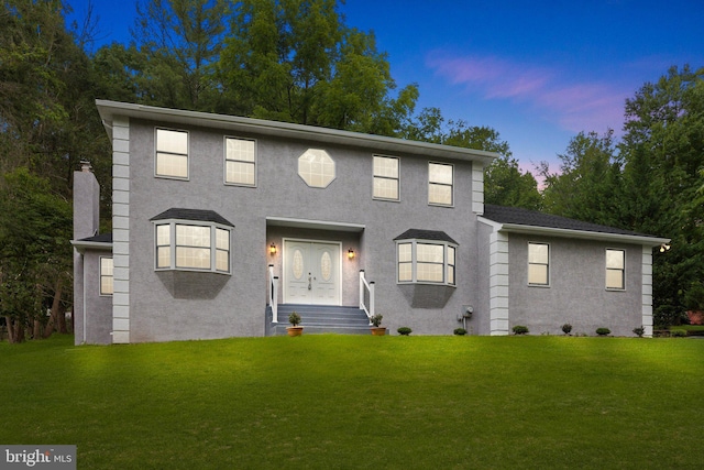 918 Andorra Rd, Lafayette Hill, PA 19444 - view of front facade with stucco siding and a front yard