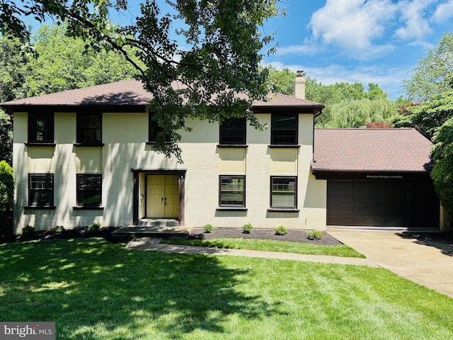 3731 Acosta Rd, Fairfax, VA 22031 - view of front of home with brick siding, a chimney, an attached garage, concrete driveway, and a shingled roof